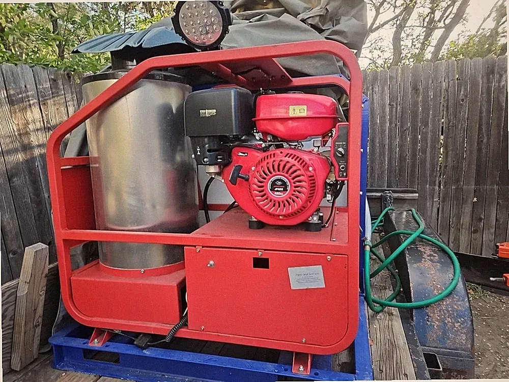 hot water pressure washer with 300 gal water tank 4000psi. on skid.
